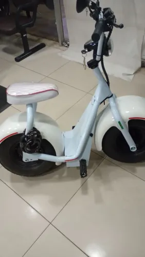 Moto elétrica tuy 10 meses comprada nota fiscal chave reserva
