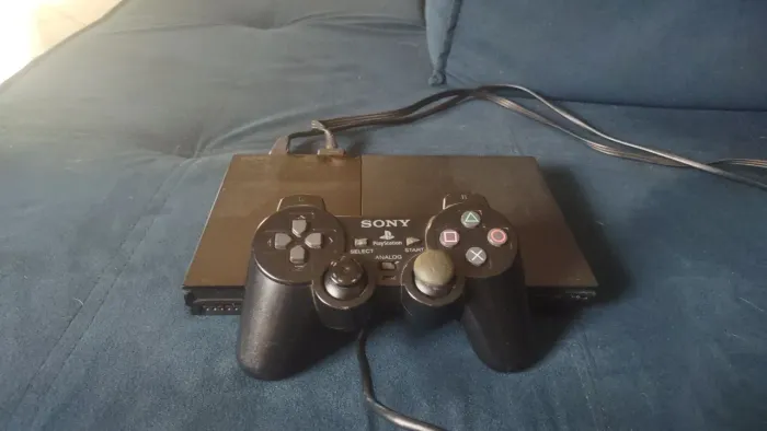 PS2 impecável , inclui 1 controle e cabos