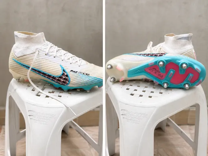 Chuteira Nike AirZoom Botinha Trava mista.