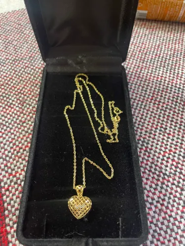 Corrente de ouro com pingente