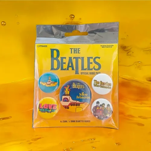 Conjunto oficial de cinco broches dos The Beatles, com o tema "Yellow Submarine"