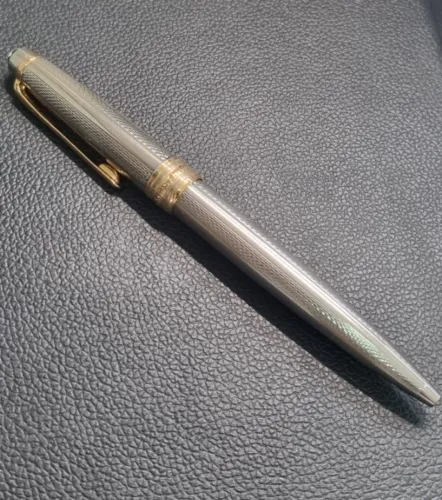 Caneta esferográfica MONTBLANC original, em prata e ouro, modelo raro: Solitaire, seminova