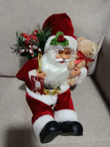 Papai Noel sentado luxuoso