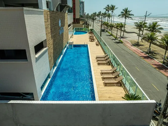Apartamento Frente Mar à Venda em Mongaguá | 2 Quartos (1 Suíte) | 67,55m² | Vista Lateral