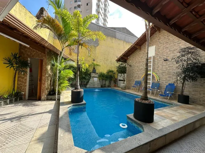 Casa com piscina à venda, 109 m² por R$ 1.490.000 - Caiçara - Praia Grande/SP