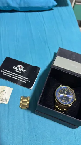 Relógio Oriente Dourado 