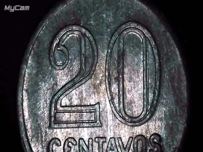 Moeda 20 centavos 1960 (escassa), com inclinação a esqd de 30º no anverso (MBC para MBC++)