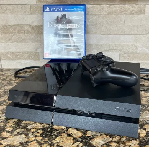 Vendo PS4 + Manete original