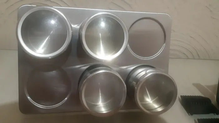 Porta temperos em aço inox - 4 peças - 29,99.