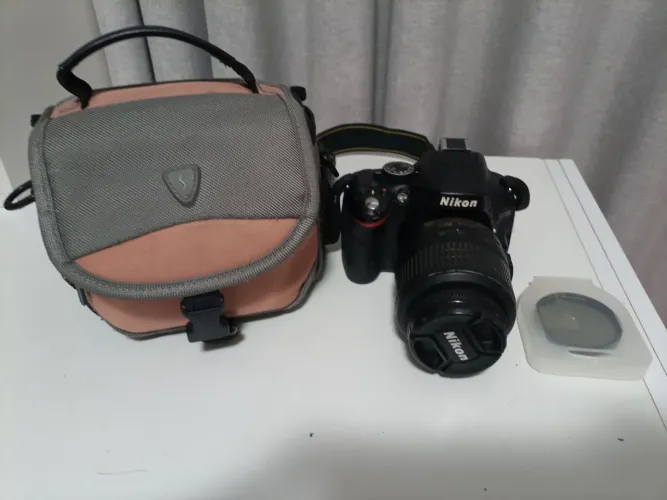 Câmera Nikon D5100 com case
