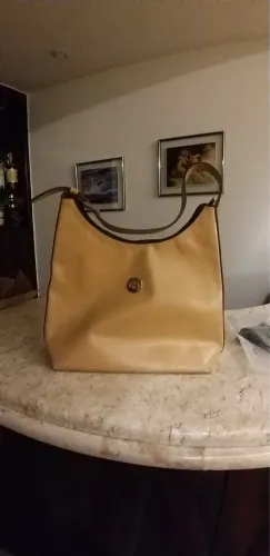 Bolsa de couro mostarda  com detalhes marrons