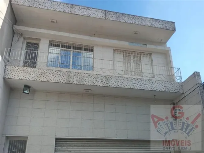 Imóvel com 03 salões comerciais e 02 apartamentos para venda na Avenida Imirim com 1148m2.