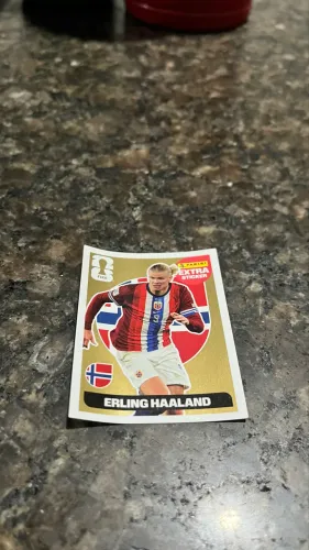 FIGURINHA EXTRA GOLD STICKER ERLING HAALAND - COPA DO MUNDO FIFA 2026 (PANINI)