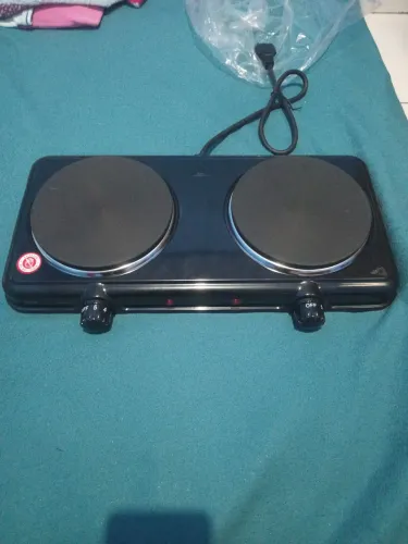 Estou vendendo fogão elétrico 100 reais semi-novo nunca usado, Elgin 127 vts