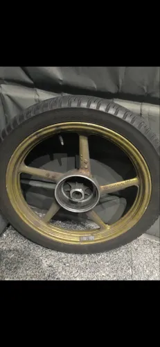 Vendo escapamento estralador de lata e roda traseira da Factor 125 2012