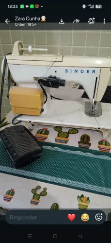 Máquina de costura singer