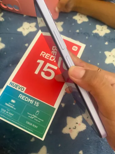 Celular novo REDMI 15 ,com apenas 5 meses de uso
