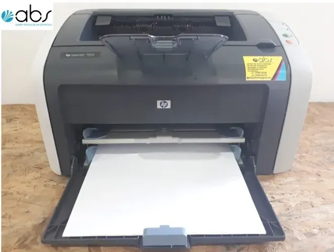 Impressora a laser HP 1010 em ótimo estado c/um toner novo e garantia