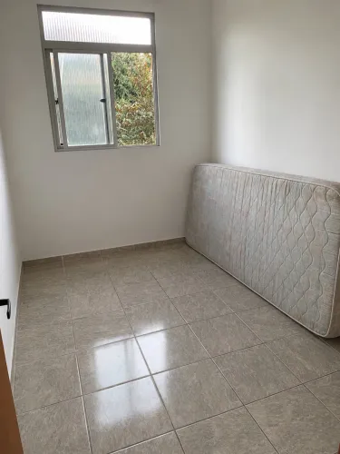 Quarto em casa compartilhada