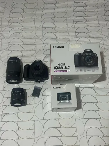 câmera Cânon Sl2 nova com lentes dslr