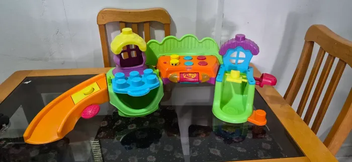 Brinquedo vila dos blocos fisher price usado