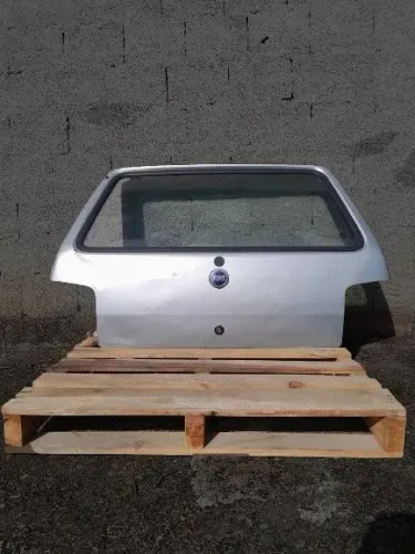 Tampa de Mala Fiat Uno Mille 2004-2013 Original