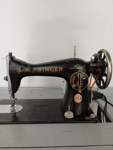 Máquina de costura singer