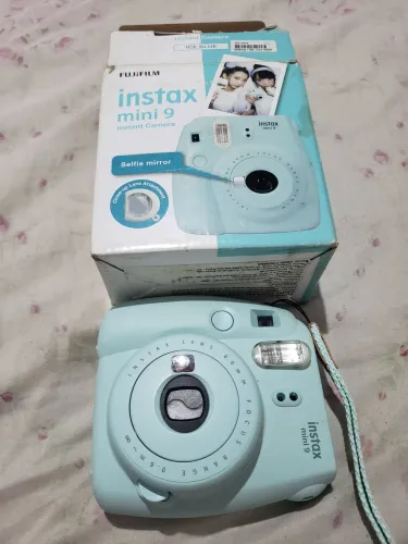 Maquina(câmera) INSTAX mini 9. Super conservada, usada apenas uma vez, com caixa e manual.
