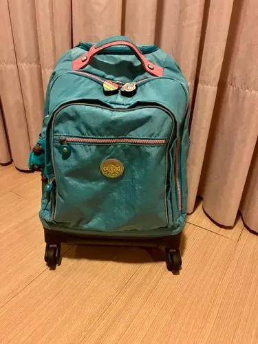 Mochila kipling new zea azul turquesa 26 Litros com rodinhas 360°