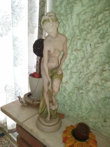 Estatueta resina
