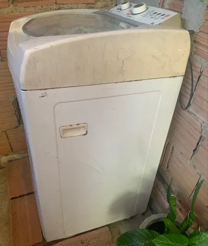 Máquina de lavar com defeito