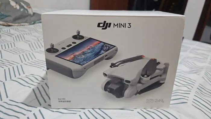 DRONE DJI MINI 3 COM TELA,USADO SÓ P.TESTAR, SEM MARCA DE USO.F: *.