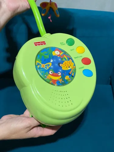 Móbile fisher price, acende, toca musica e gira, funcionando tudo. 100 reais!!