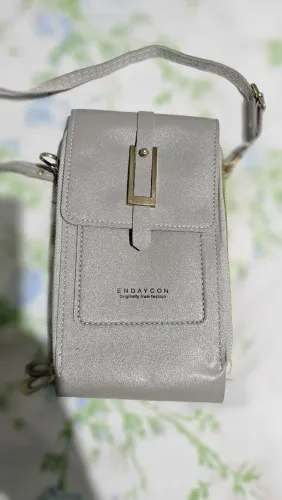 Bolsa Feminina Cinza Discreta Porta passaporte Viagens Útil e Charmosa, Usada