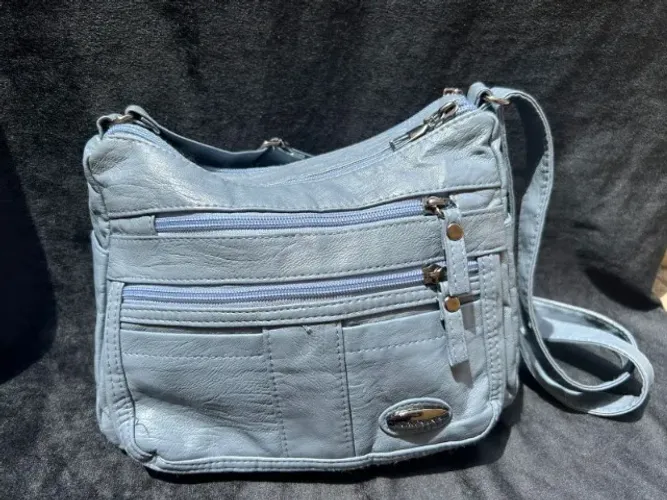 bolsa de ombro espaçosa com vários bolsos