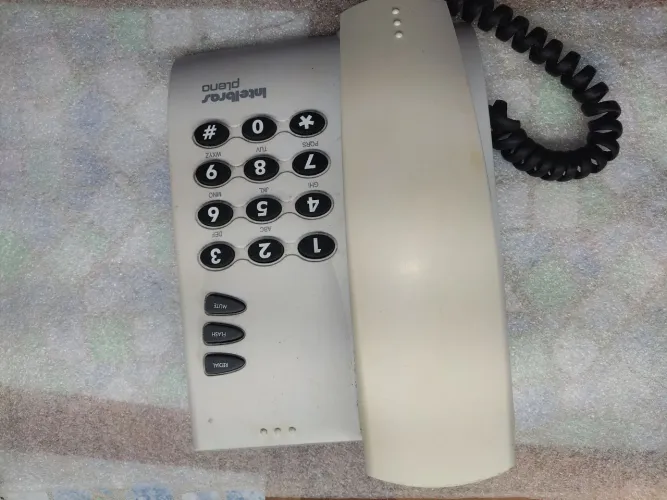 Telefone fixo com fio usado