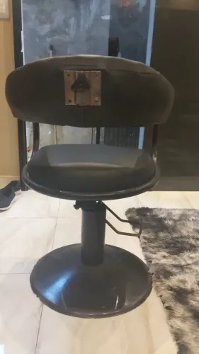 Cadeira de cabeleleiro em bom estado
