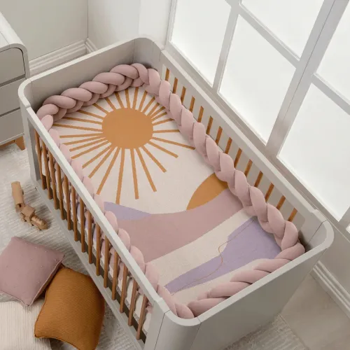 Trança protetora para berço e cama em tricot 