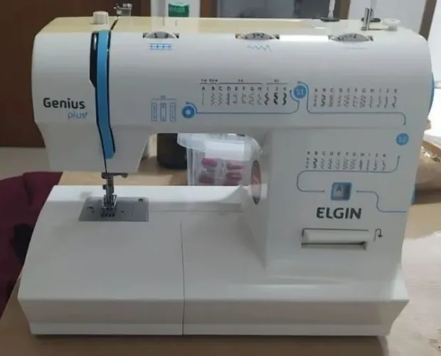 Máquina de costura Elgin genius plus 