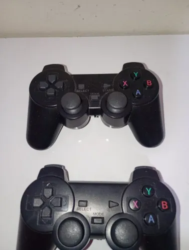 Videogame game stick vem com dois controles e