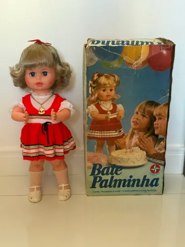 Boneca Bate Palminha