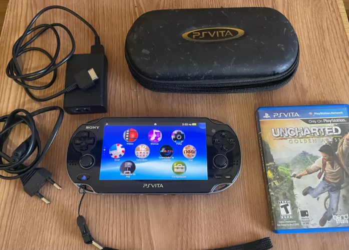 PS Vita OLED usado + Jogo Uncharted Golden Abyss (Envio OlxPay)
