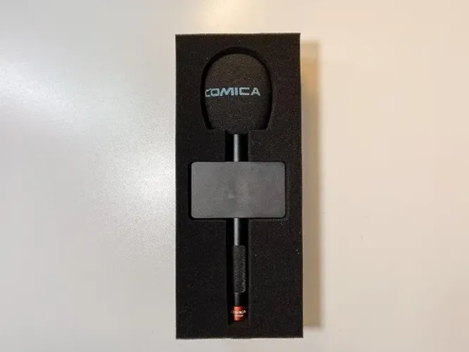 O Comica HR-WM é um adaptador portátil de mão que transforma um microfone de lapela sem fi