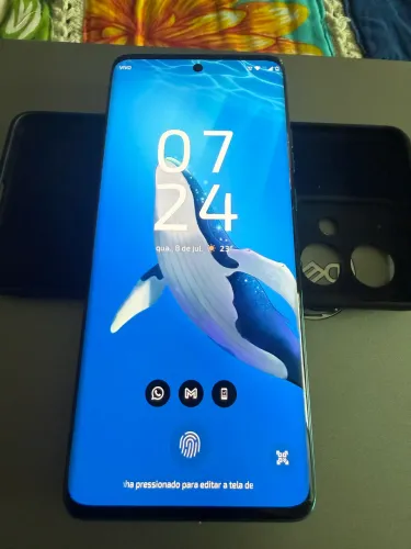 Celular Motorola edged 40 neo , na cor azul com caixa e nota sem detalhes super novo