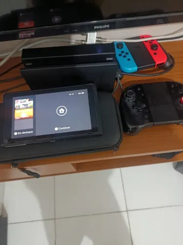 Nintendo switch v1 desb cartão de 256 + controle adicional