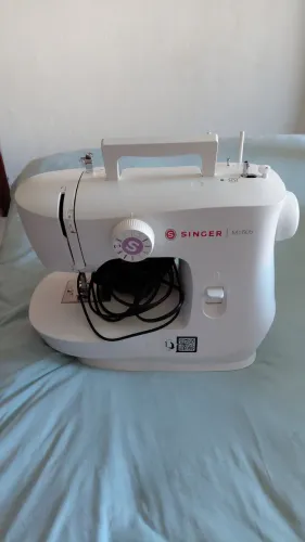 Vendo máquina singer nova