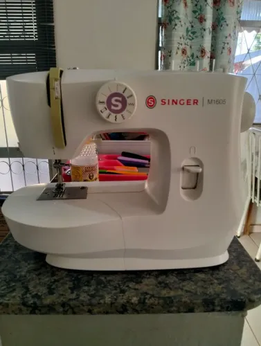 MÁQUINA DE COSTURA SINGER ?