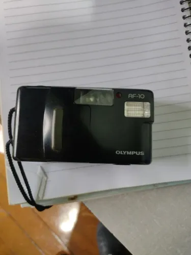 Máquina de fotos Olympus em perfeito estado de conservação funcionando tudo 
