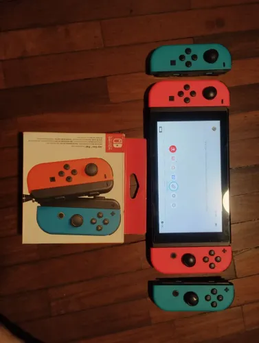 Nintendo Switch Completo + 2 Pares de Joy-Con + Dock para TV