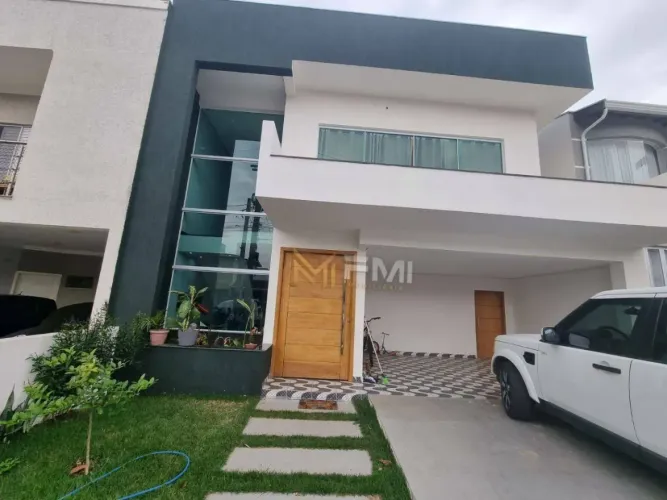 Sobrado com 3 dormitórios à venda, 180 m² por R$ 925.000,00 - Condomínio Flamboyant - Hort